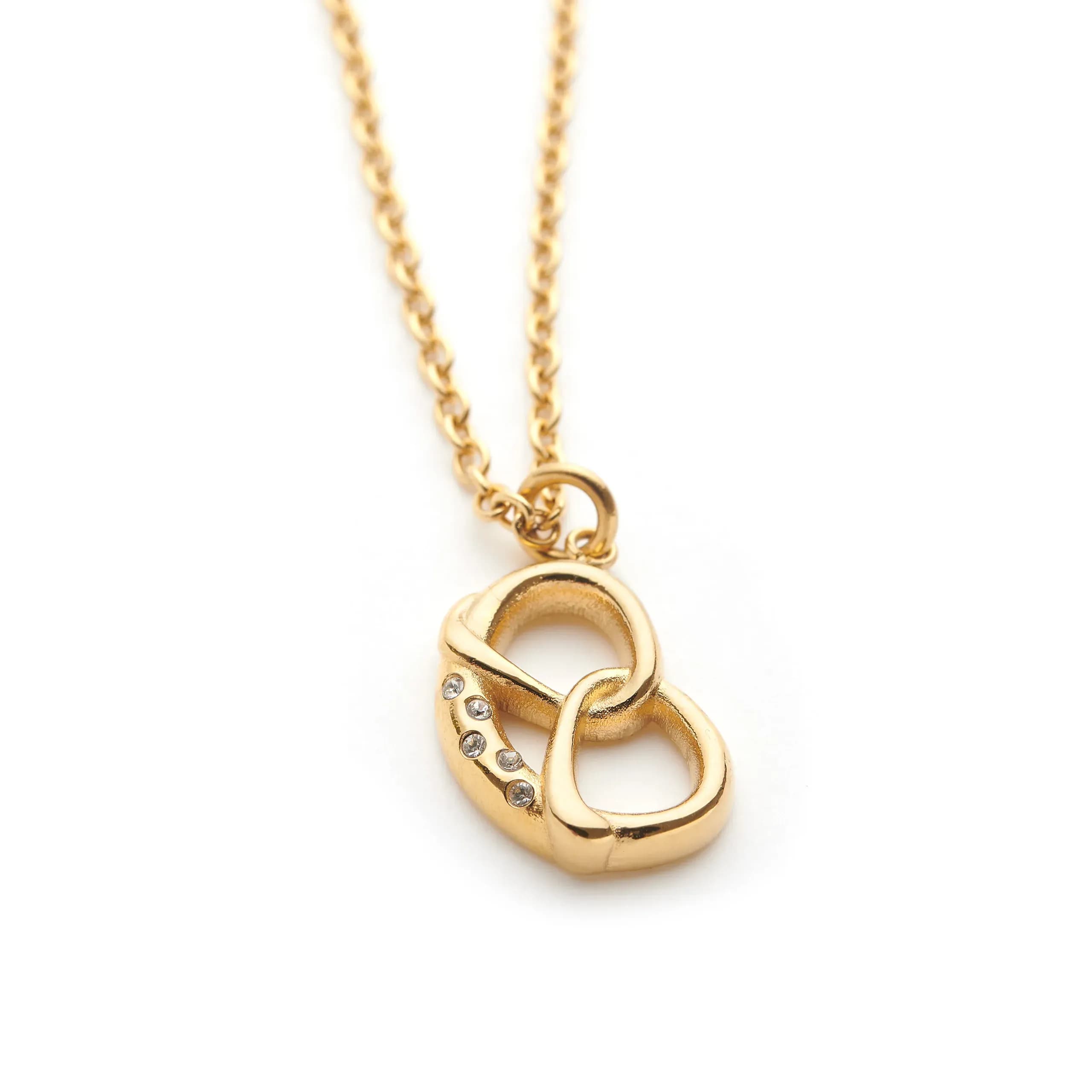 Goldfarbene Halskette mit Brezelmotiv